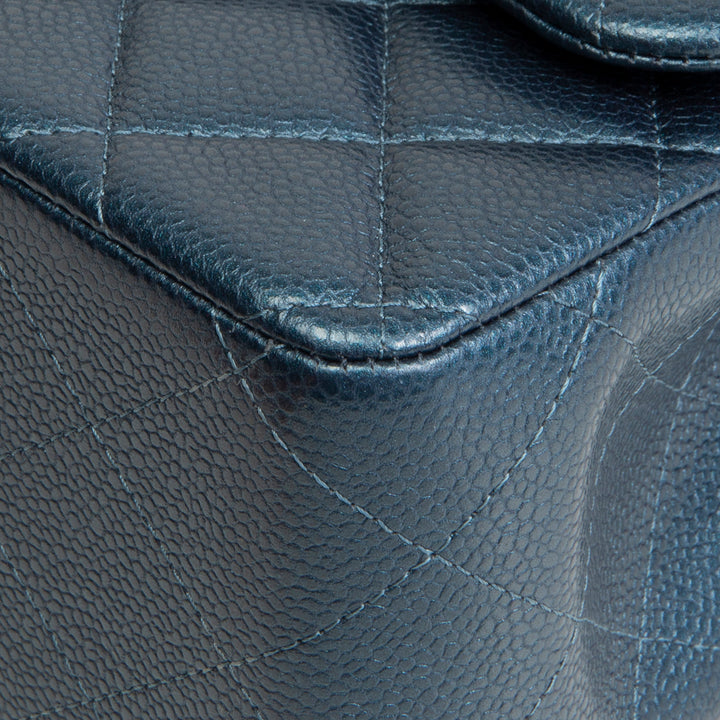 CHANEL Quilted Caviar Jumbo Double Flap Bag - Iridescent Navy