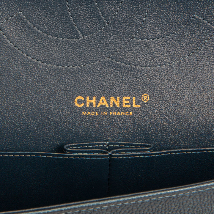 CHANEL Quilted Caviar Jumbo Double Flap Bag - Iridescent Navy