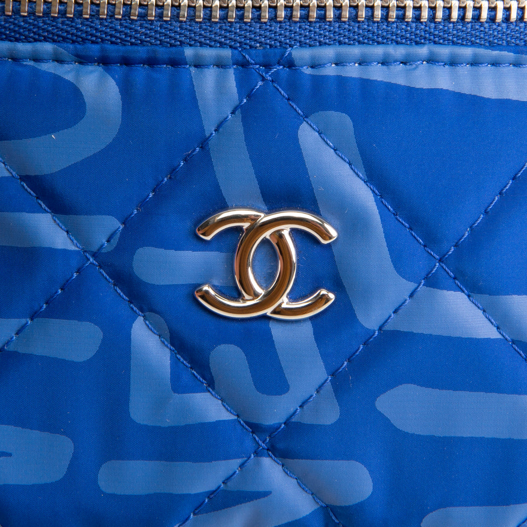 CHANEL Coco Neige Arm Coin Purse - Blue