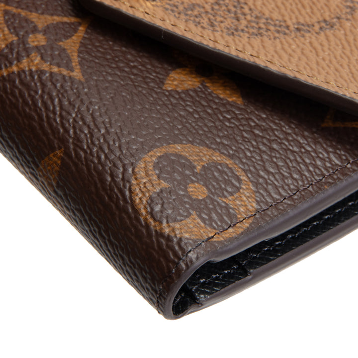 LOUIS VUITTON Monogram Reverse Zoe Wallet