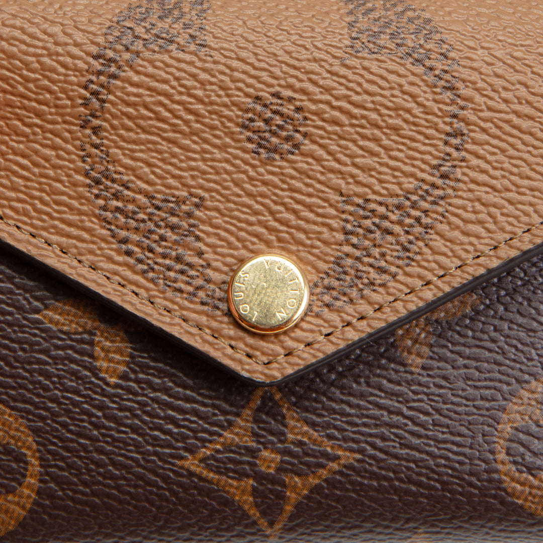 LOUIS VUITTON Monogram Reverse Zoe Wallet