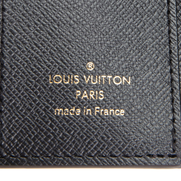 LOUIS VUITTON Monogram Reverse Zoe Wallet