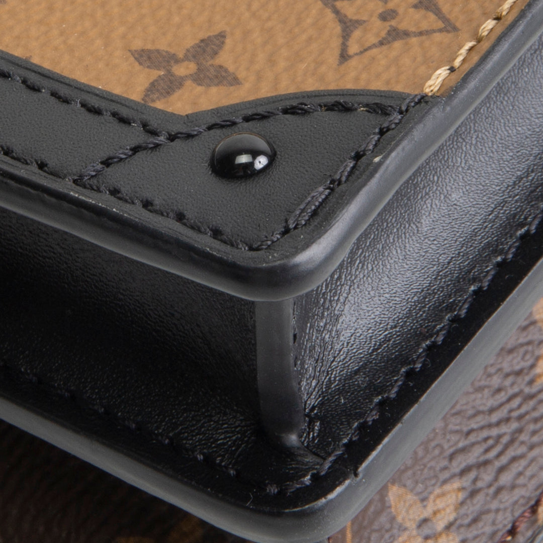 LOUIS VUITTON Reverse Monogram Trunk Clutch