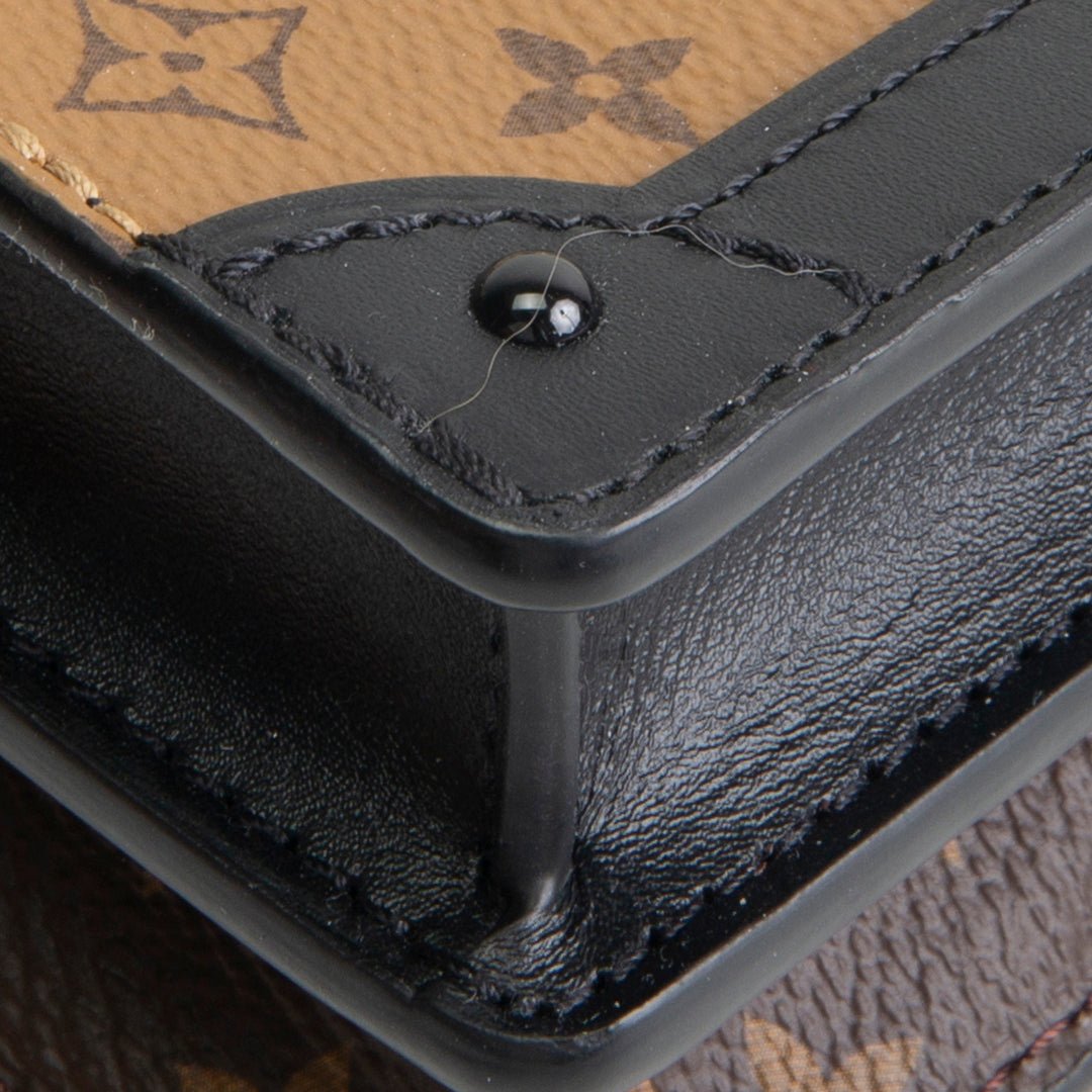 LOUIS VUITTON Reverse Monogram Trunk Clutch