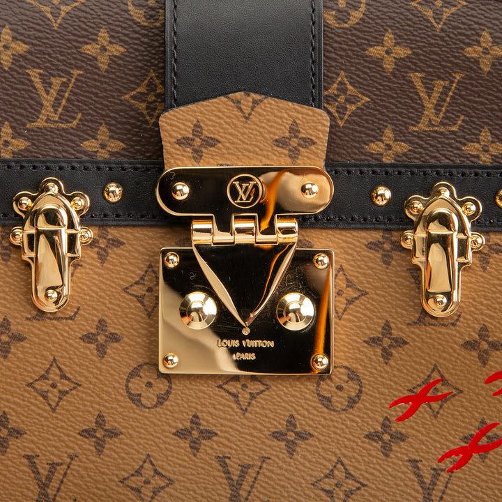 LOUIS VUITTON Reverse Monogram Trunk Clutch