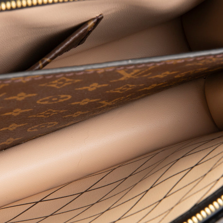 LOUIS VUITTON Reverse Monogram Trunk Clutch
