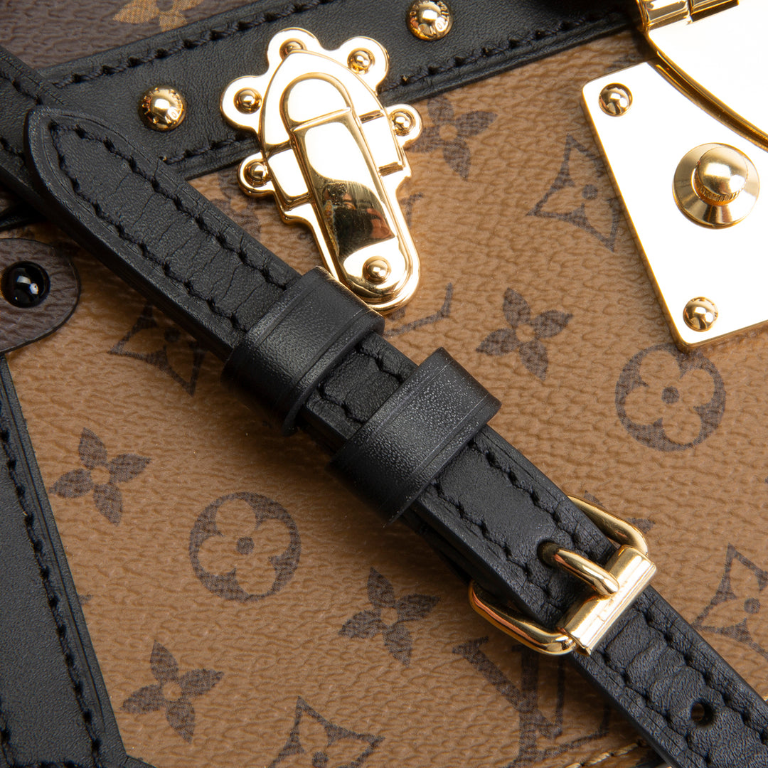 LOUIS VUITTON Reverse Monogram Trunk Clutch