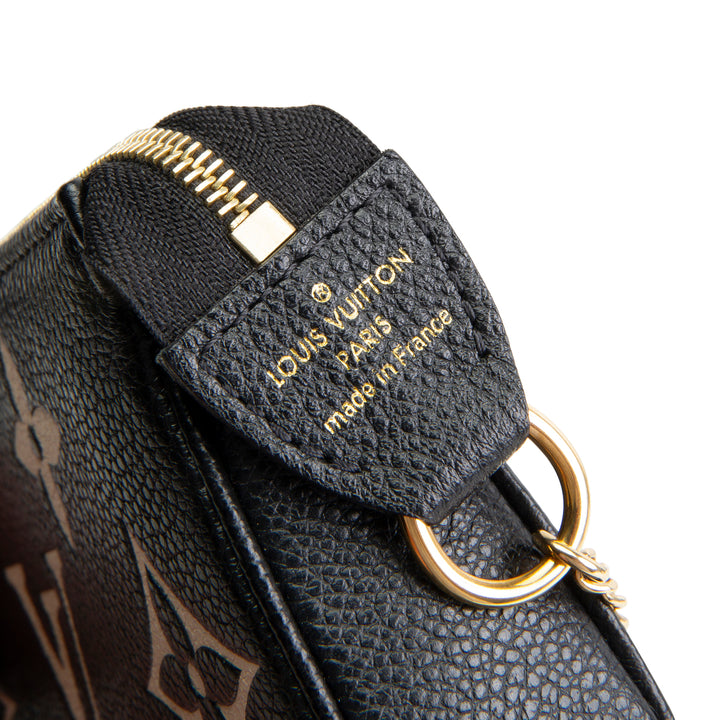 LOUIS VUITTON Bicolor Empreinte Mini Pochette Accessoires - Black / Beige