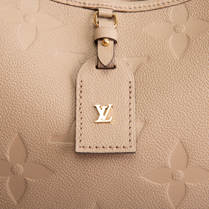 LOUIS VUITTON CarryAll MM Empreinte Giant Monogram - Turtledove