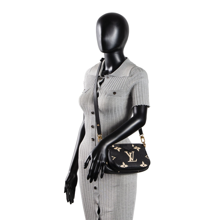 LOUIS VUITTON Monogram Bicolor Empreinte Multi Pochette Accessoires - Black/Cream